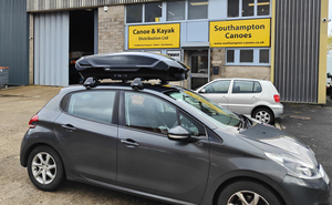 Thule Motion 3 M on a Peugeot 206 with WingBar Edge Roof Rack
