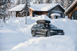 The Thule Force XT Alpine Roof Box fitted to a Volvo in the snow